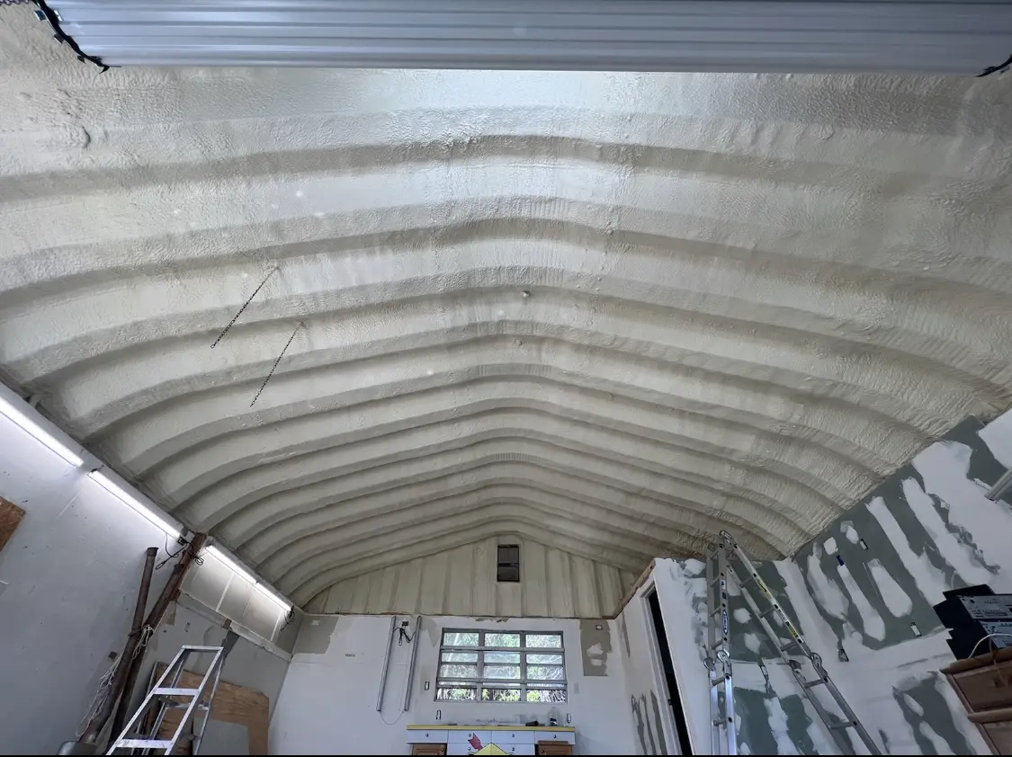 Spray polyurethane foam applied to the underside of a metal roof deck in South Sioux City